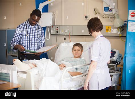 Young Nurse and Boy in Hospital